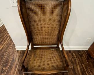 M102 - $125. Single Wingback Armchair. Caning is in good condition - but vintage! Measures 26.5" x 16.5" floor to seat x 50.5" tall. 