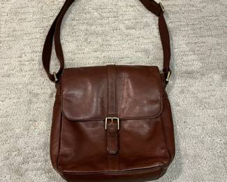 M110 - $25. Vintage Fossil Brown Leather Crossbody. Measures 11" x 3.25" x 10". 