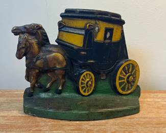 M11 - $35. Cast Iron Stagecoach Door Stop. Measures 9" wide x 6.5" tall. 