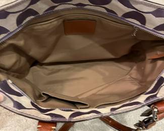M114 - $35. Vintage Signature Coach Tote. Measures 16" x 3.25" x 10". 