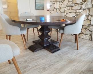 Round pedestal 60" ZigZag dining table with 6 chairs by West Elm