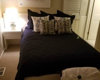 West Elm queen platform bed with end table and 6 storage drawers (shown dressed)