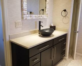 Stunning bath vanity with vessel sink by Bertch; vanity mirror. Two available