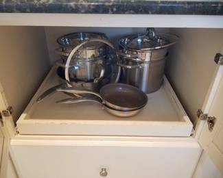 Pots & pans; cabinets feature pull-outs
