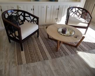 Arm chairs; coffee table; area rug