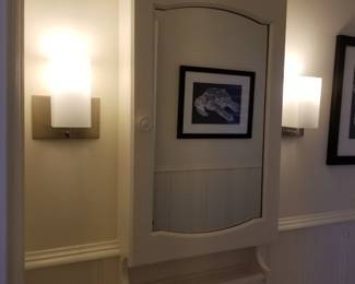 Sconce lights; mirrored medicine cabinet