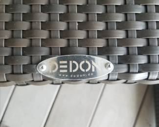 8-piece all-weather conversation set by DEDON. Couch; two accent table; two chairs; two footstools; one cooler table 