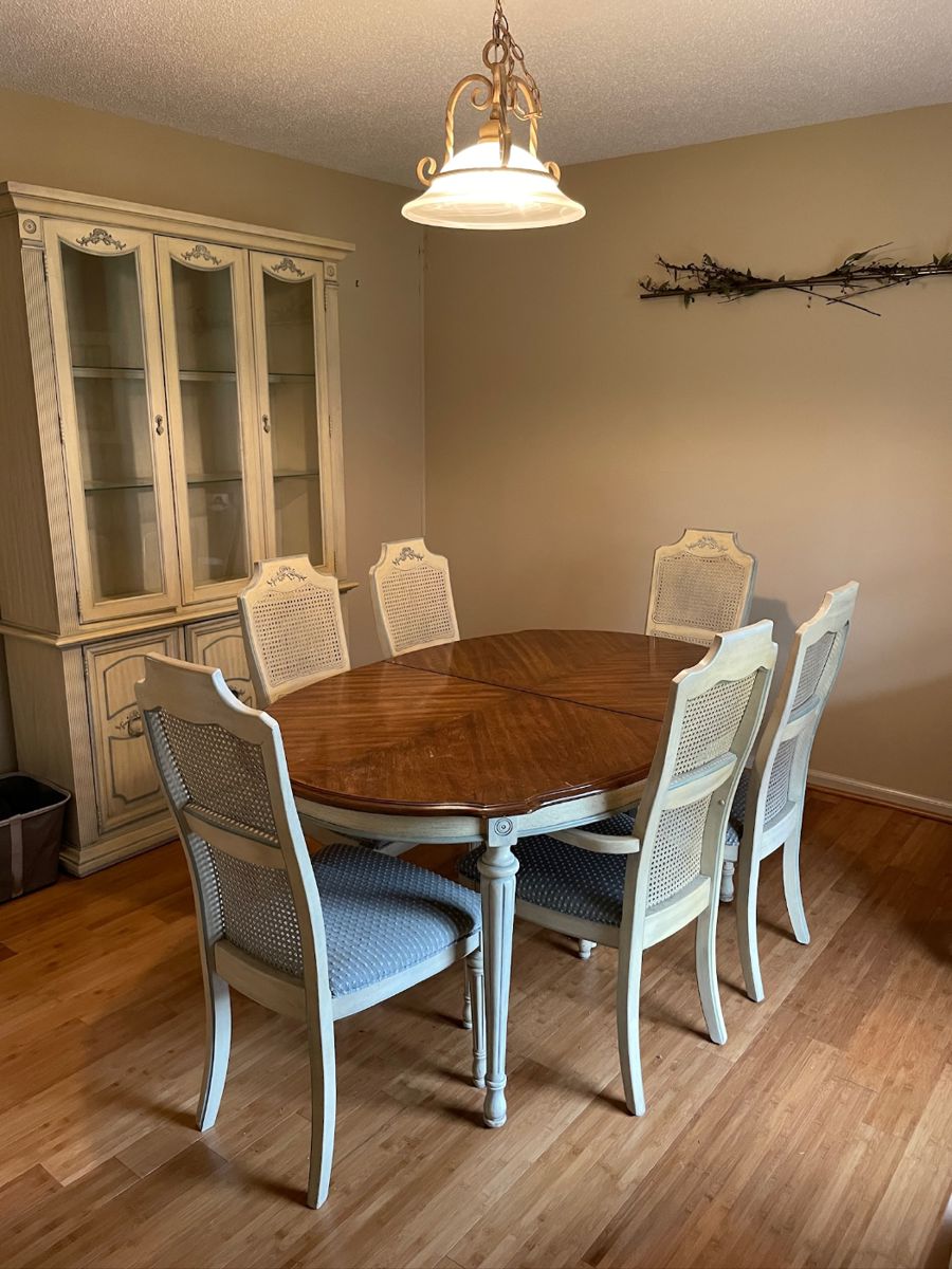 #1	Dining Room	Stanley Furniture French Provencial Style Dining table with 6 cane back chairs (1 captains chair) Hand-painted cream and robin blue - as is finish. 64Lx29Hx42W	$175.00																												