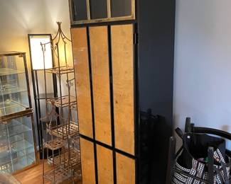 #5 living room Henredon circa 1990 lighted bar cabinet. Black lacquer, brass, mahognay burled wood, four doors, three drawers.(as is finish pictured) 82 x 19 x 27 $1,500.00