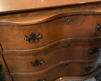 #17 Chippendale-style "mahogany" secretary bookcase with slant front writing desk. Ball and claw feet. 3 drawers, 2 doors, 2 shelves. (79h x 29w x 16d) $165.00