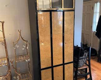 #5 living room Henredon circa 1990 lighted bar cabinet. Black lacquer, brass, mahognay burled wood, four doors, three drawers.(as is finish pictured) 82 x 19 x 27 $1,500.00