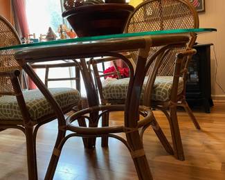 #38 Rattan and Wicker Round Glass Top Breakfast Table with matching Chairs - 28h x 42 round. $175.00