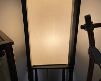 #7 Three tiered black shelf lamp with pull tab. 63 x 10 1/2 square $30.00