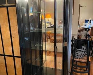 #9 Asian style, black and brass lighted display cabinet - Philip Reinisch Company, model #505. 30x 76 1/2 x 11 1/2.  $250.00