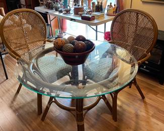 #38 Rattan and Wicker Round Glass Top Breakfast Table with matching Chairs - 28h x 42 round. $175.00