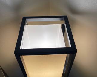 #7 Three tiered black shelf lamp with pull tab. 63 x 10 1/2 square $30.00