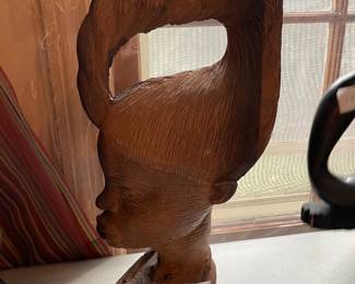 #110 Hand carved African wood art of woman $25.00