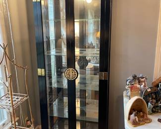 #9 Asian style, black and brass lighted display cabinet - Philip Reinisch Company, model #505. 30x 76 1/2 x 11 1/2.  $250.00