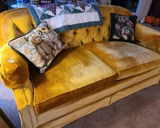 pair of vintage gold tufted velvet sofas