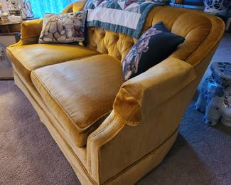pair of vintage gold tufted velvet sofas