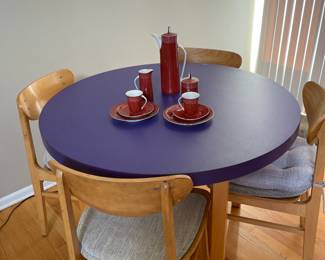 Fun purple table and chairs, Polish dishes