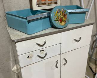 Vintage cabinet and old fridge drawers