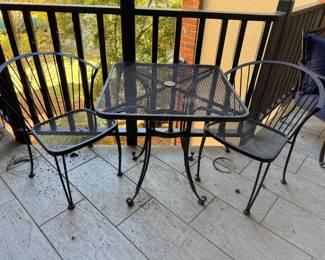 A Three-Piece Carolina Forge Wrought Iron Bistro Patio Set
