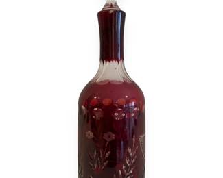 A Czech Bohemian Ruby Red Cut-to-Clear Glass Decanter with Faceted Stopper