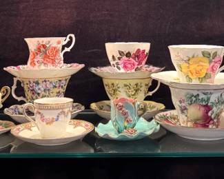 A Collection of Ten Decorative Porcelain and China Teacup and Saucer Sets