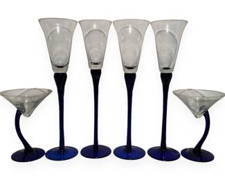 A Set of Six Libbey Cobalt Blue Stem Glasses, comprising Domaine Flutes and Swerve Martini Glasses