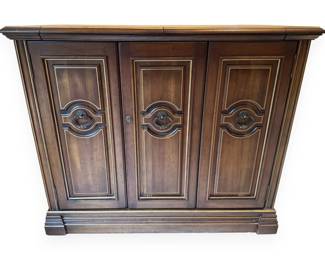 A Traditional Style Dark Stained Wood Bar Cabinet or Credenza with Pinstriping, 20th Century
