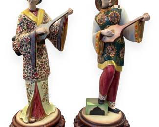 A Pair of Polychrome Glazed Porcelain East Asian Musician Figurines