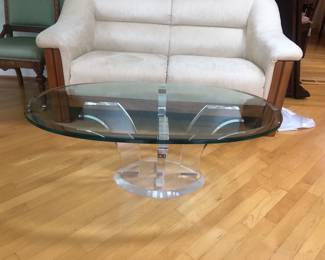 Glass top and lucite base coffee table