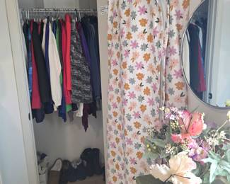 pair of floral, room-darkening curtains