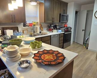 lots of dishes, cookware, dishware, bowls, mugs, platters, and so much more!  