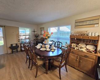 Dining room table with 6 chairs (2 armchairs), vintage maple buffet cabinet with wine glass holder and lots of storage