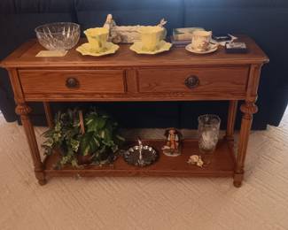 The sofa table will be available for pre-sale $85