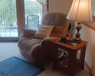 The electric recliner will be available for pre-sale, some wear, $55, showcase table available for pre-sale $50