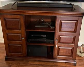 Solid wood TV Cabinet. Shelving inside for CD's