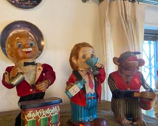 vintage Charlie Weaver Bartender toy… vintage "Blushing Willy" battery-operated tin toy bartender… cymbal-banging monkey toy, also known as a Jolly Chimp.