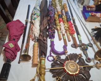 * Spanish Banderillas (used in bull fights).  Spanish Wall Plaques and Swords, Umbrellas