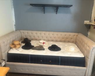 Day bed and hats 