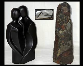 Modernist Statue and Evans Labeled Sculpture