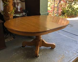 Oak reproduction table with one leaf.