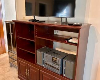 Bookcase/ Entertainment Center with storage