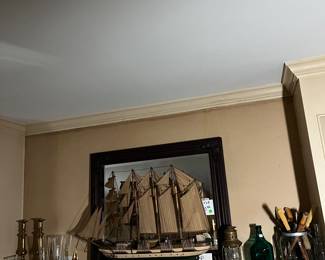 Vintage hand made sailboat. Lots of other sailing memorabilia.