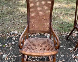 Antique rocker with cane. 