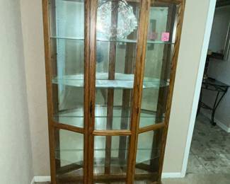 THREE-SIDED LIGHTED CURIO CABINET
