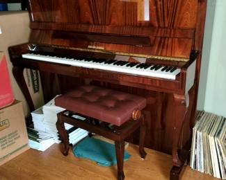 Rieger Kloss model 122 Demichippendale upright piano and adjustable bench