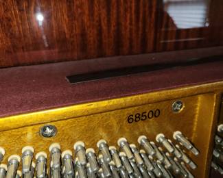 Rieger Kloss model 122 Demichippendale upright piano and adjustable bench